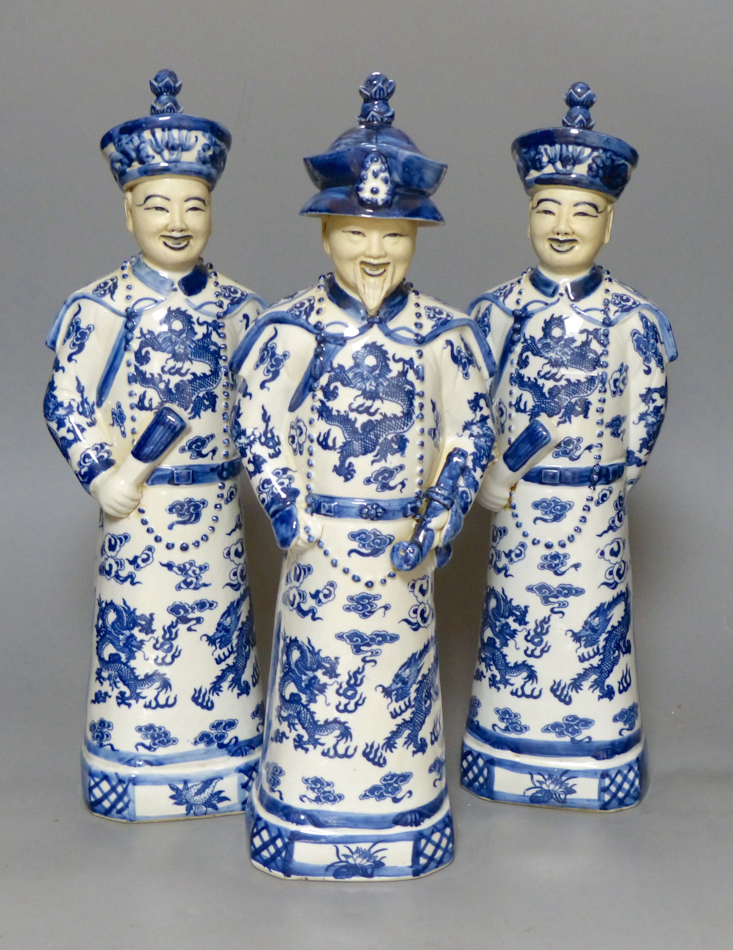 Three Chinese blue and white figures, tallest 45c